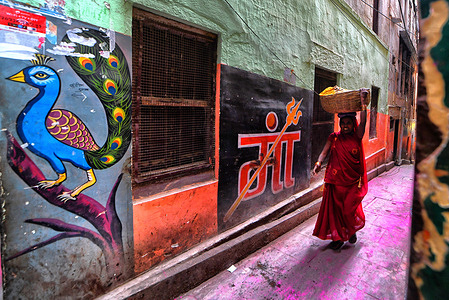 A vegetable vendor sells her produce in the alleys around the Dashashwamedh Ghat where most of the Hindus practice vegetarianism.