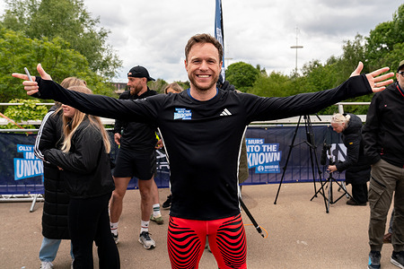 Olly Murs seen happy and celebrating after crossing the finish line. Olly Murs has completed his 'In to The Unknown' brutal 400KM endurance challenge in aid of Unicef at the queen Elizabeth Olympic Park Stratford in London, UK on the morning of 15th may 2026 where Soccer Aid will be held at the end of the month.
Olly crossed the finish line and was met with lots of supporters and TV camera crew broadcasting live on This Morning.