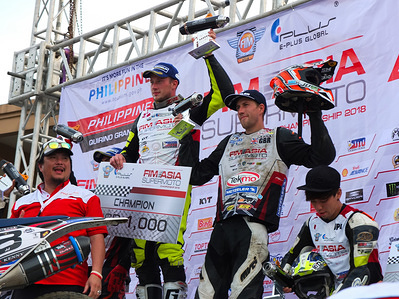 Simon Vilhelmsen of Denmark and Lewis Cornish of Great Britain seen raising their trophies during the awarding ceremony of the FIM Asia Supermoto Championship in Manila.
The FIM Asia SuperMoto Championship 2018 at the iconic Quirino Grandstand at Rizal Park located in the heart of the capital city of Manila.
Supermoto is a motorcycle race that highlights biker skills on a circuit that alternates between flat track, motocross and road racing, using custom made motorcycles designed to meet the demands of the different racing conditions.