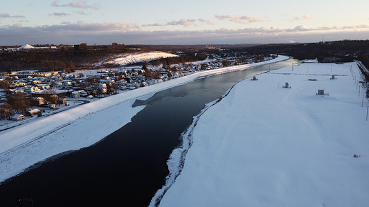 (EDITORS NOTE: Image taken with drone)
A general view of a partially frozen Great Miami River in Miamisburg.
Winter Storm Uri leaves over six inches of snow in more than 25 states across the United States.