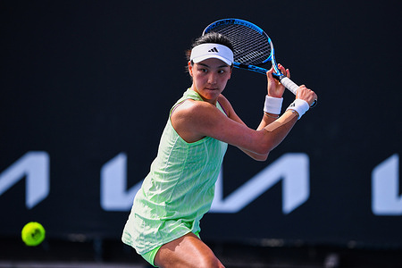 Xinyu Wang of China plays against Diane Parry of France (not in picture) during Round 1 match of the Australian Open Tennis Tournament at Melbourne Park. Parry won against Wang in 3 sets with a final score 6:3, 2:6, 6:3