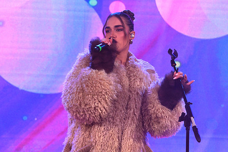 Clara Soccini performs during the "Welcome Winter" - Courmayeur's Christmas Tree Lighting Ceremony.