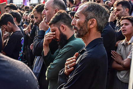 Kashmiri Shiite Muslims perform rituals during a religious procession ahead of Ashura on the eighth day of Muharram. Muharram is a month of mourning in remembrance of the death of Imam Hussain, the grandson of Prophet Muhammad (PBUH).