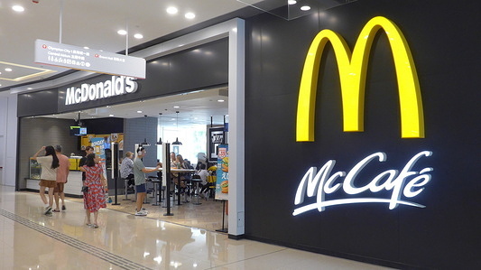Customers are seen ordering for food in an automated self-ordering kiosk at an American multinational fast food chain McDonald's store in Hong Kong, China.