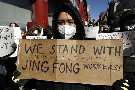 A demonstrator from 318 restaurant workers union holds up a placard during a demonstration against the closure of Jing Fong restaurant in Chinatown. 
Recent extraordinary rental demands placed by Jonathan Chu, the biggest landlord in Chinatown, on small business has forced many to shutter their doors. Such demands have forced Jing Fong restaurant to end operations by March 7, 2021.