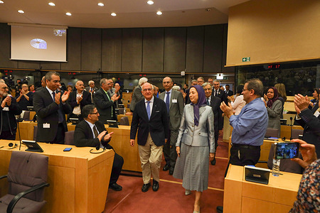NCRI President-elect Maryam Rajavi seen entering the conference hall accompanied by Javier Zarzalejos to applause from the assembled attendees. A cross-party coalition of European Union lawmakers and international dignitaries convened at the European Parliament in Brussels on April 22, 2026, for the conference "Iran: Take Action to Stop Executions — Where Does the EU Stand?". Speakers rejected both the current theocracy and any return to monarchy, recognizing the National Council of Resistance of Iran (NCRI) and Maryam Rajavi’s Ten-Point Plan as the viable democratic alternative. Key demands included an immediate halt to executions and the closure of regime embassies to end the transnational repression of dissidents. The summit emphasized that the EU must support the organized resistance to achieve a free, non-nuclear republic.