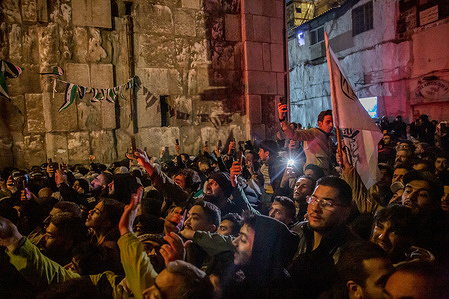 Crowds of people wait outside Umayyad Mosque in Damascus, as interim president Ahmad al-Sharaa is praying inside, on the morning of the first anniversary of the fall of the Assad regime. Bashar al-Assad and his father Hafez ruled Syria for more than half a century before Bashar was ousted in December 2024.