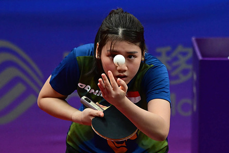 Xin Ru Wong of Singapore is seen in action during the 19th Asian Games Women's Table Tennis Team Preliminary Group match between Singapore and India held at the Gongshu Canal Sports Park Gymnasium. Wong lost 2-3 to Sreeja Akula (not pictured) of India. Final score India 3:2 Singapore.