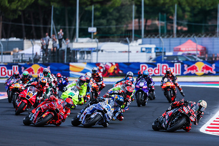 (R-L) Marco Bezzecchi of Italy and Aprilia Racing leads the Sprint Race followed by Alex Marquez of Spain and BK8 Gresini Racing MotoGP and Marc Marquez of Spain and Ducati Lenovo Team during the MotoGP GP16 Red Bull Grand Prix of San Marino and the Rimini Riviera - Sprint Race at Misano World Circuit Marco Simoncelli.