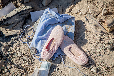 A child's shoes lie in the rubble following an air strike in Ain el Delb, near the city of Saida. Multiple Israeli airstrikes hit several cities in Lebanon, including Ain el Delb near Saida and the Bekaa Valley, resulting in numerous casualties. At least 45 people were killed in Ain el Delb, while three others died in the Bekaa Valley. Israel's assault on Lebanon has been described as one of the most intense aerial campaigns in recent history.