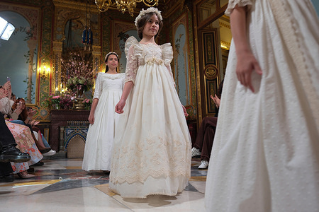 Models showcase creations by ASN Madrid during the Atelier Couture bridal catwalk with in Madrid Fashion Week, held at Santa Isabel Palace.