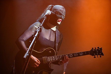 Alice Chiara, guitarist of Sick Tamburo, performs on stage at the Estragon Club in Bologna. Sick Tamburo confirms its position as a cornerstone of the Italian alternative music scene. A project born from the creative union of Gian Maria Accusani and Elisabetta Imelio.