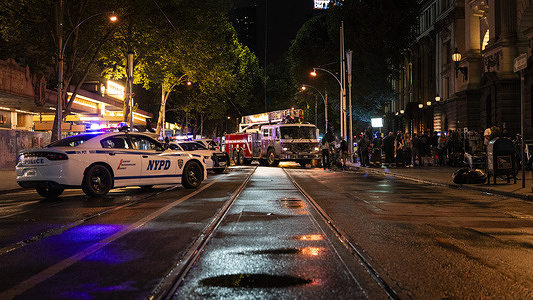 NYPD patrol cars and a FDPY fire engine seen parked outside the town hall. Production is underway for the upcoming film Empire City as Melbourne Town Hall is transformed into a slice of New York City. NYPD patrol cars, a genuine FDNY fire engine and carefully detailed New York themed props dramatically reshape the streets.