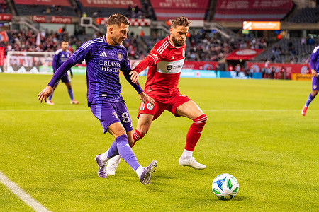 Orlando City Forward Marco Pasalic (87) battles for the ball with Chicago Fire Forward Philip Zinckernagel (11) during the Chicago Fire vs Orlando City match at Solider Field. Final Score: Chicago Fire - 0, Orlando City - 0
