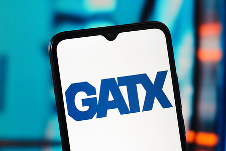 In this photo illustration, the GATX logo is seen displayed on a smartphone screen.