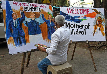 A teacher from Gurukul school of art paints an art piece welcoming trade deal between India and European Union (EU) outside the art school in Mumbai. The trade deal announced that India and European Union countries (EU) would reduce more than 90% of tariffs on the goods traded between them especially in agriculture and autos reducing reliance on United States.