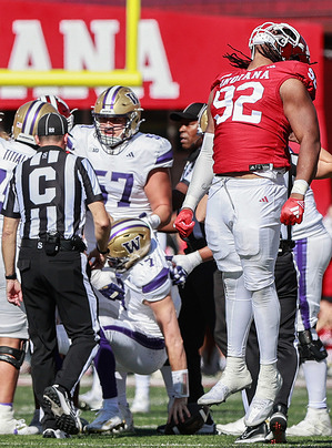 Indiana Hoosiers defensive lineman Marcus Burris Jr. (92) reacts after sacking Washington Huskies quarterback Will Rogers (7) during an NCAA football game at Memorial Stadium in Bloomington, Indiana. The Hoosiers beat the Huskies 31-17.