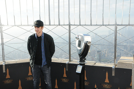 Hayden Christensen poses for photos at the 86th floor observatory. Actor Hayden Christensen, who will reprise his role as Darth Vader 15 years after the Star Wars Prequels for Disney's Obi-Wan Kenobi series, visits the Empire State Building to celebrate New York Comic Con, in New York City.