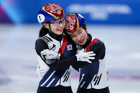 (R-L) Gilli Kim and Minjeong Choi of South Korea celebrate gold and silver medals during the Short Track Speed Skating Women's 1500m Finals of the Milano Cortina 2026 Winter Olympics at Milano Ice Skating Arena in Milan