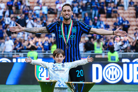 Hakan Calhanoglu of FC Internazionale seen posing with his son during Serie A 2025/26 football match between FC Internazionale and Hellas Verona FC at San Siro Stadium. FC Internazionale 1 - 1 Hellas Verona FC