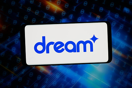 In this photo illustration, the logo of Turkish video game company Dream Games is displayed on a smartphone in front of abstract background on computer screen.