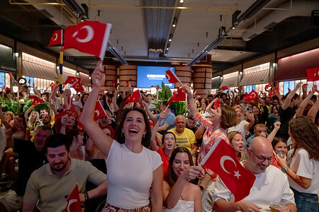 Turkish fans are seen following the match with great enthusiasm. The Turkish National Basketball Team finished as European runners-up after losing 88-83 to Germany in the European Championship final. The final match was watched with great excitement by fans on giant screens set up in Kadikoy.