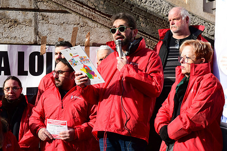 A protester is seen giving a speech during the demonstration. Protesters from the Loire Departmental Tobacco Federation gathered in front of the courthouse to protest against competition from contraband cigarette sellers and the associated trafficking.
