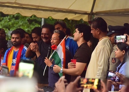 Indian actor, politician Prakash Raj and activist Sonam Wangchuk and CJP founder Abhijeet Dipke attend a protest organised by the Cockroach Janta Party (CJP) against alleged irregularities in country's major examinations at Freedom Park.