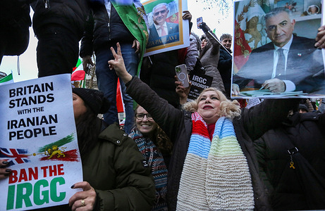 Royalist protesters gather with signs of Reza Pahlavi and flags and call for an end to the current Iranian regime during the demonstration. People take part in a rally in solidarity with protesters in Iran, in London, England starting outside the Iranian embassy. Later members of the Iranian community gathered outside Downing Street, calling on the British government to support Iranians as anti-government protests continue across Iran. The demonstrations have followed economic troubles in the country and the regime shutting down the internet and arresting many protesters.
