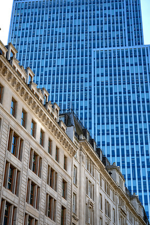 Traditional and modern British architecture side by side in the Square Mile of London, the financial and banking district of the capital of the United Kingdom.