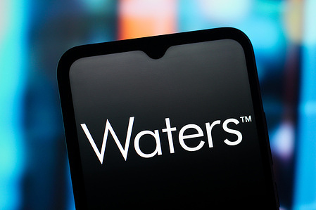 In this photo illustration, the Waters Corporation logo is seen displayed on a smartphone screen.