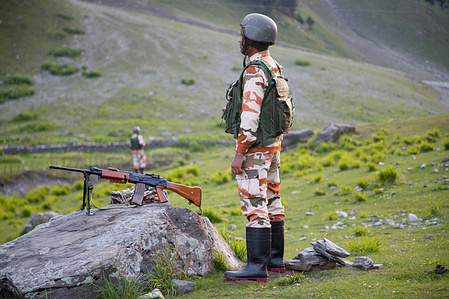 Indian paramilitary soldiers guards at a security post ahead of the annual Amarnath Yatra, a Hindu pilgrimage to the Amarnath cave shrine, near Baltal, some 100 km (62 miles) east of Srinagar, Indian-administered Kashmir. Security has been heightened ahead of the annual Amarnath Yatra, a major Hindu pilgrimage that begins on July 3, with thousands of Indian paramilitary personnel, police and other security forces deployed along the pilgrimage routes, at base camps and key transit points. Indian authorities said they have implemented a multi layered security plan that includes checkpoints, road opening patrols, surveillance systems, drone monitoring and emergency response teams to help ensure the safe conduct of the pilgrimage. The deployment is part of extensive security arrangements for the pilgrimage amid longstanding security concerns in the region.