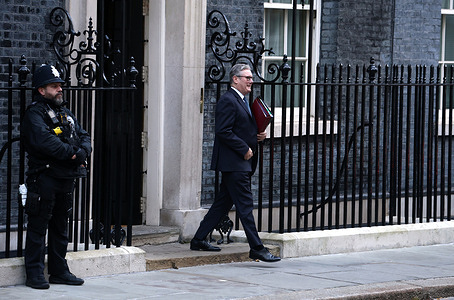 British Prime Minister Sir Keir Starmer leaves 10 Downing Street for Prime Minister's Questions.