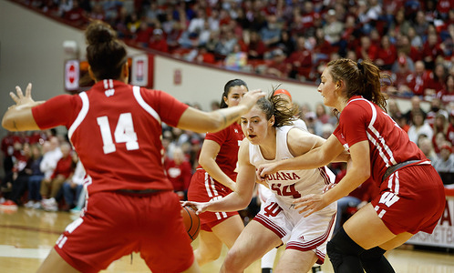Indiana Hoosiers forward Mackenzie Holmes (54) goes to the basket against Wisconsin during an NCAA women's basketball game at Simon Skjodt Assembly Hall in Bloomington. 
Indiana beat Wisconsin 93-56.