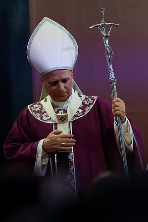 The pontiff leaves the church at the end of the mass wearing the white mitre and holding the crucifix in his hand. Pope Leo XIV presided over the Eucharistic celebration for the faithful departed at the monumental entrance to the Verano Cemetery.