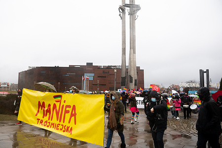 People seen gathered at the Solidarity Square with Manifa banner during the Manifa in Gdansk.
This year's Manifa slogan highlights the message of the Women's Strika in Poland - My Body, My Life, My Decision - which has been going on for 4 months. People want freedom and respect for their rights and dignity. Manifa is an annual feminist demonstration organized in connection with Women's Day in various parts of Poland.