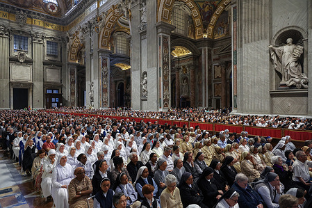 Overview of the basilica with the nuns sitting. Cardinal Fernandez Artime presides over the eighth Mass of the Novendiali in suffrage of Pope Francis at the altar of St. Peter in the Vatican Basilica. Waiting for the conclave and the election of the new Pontiff.