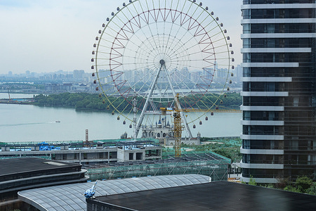 A view of a Ferris wheel under construction on the east bank of Jinji lake in Suzhou.