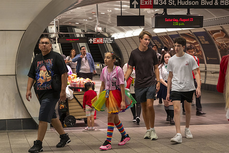People some in costumes inside the Hudson Yards Subway Station during the 2025 Anime NYC at Jacob Javits Center on August 23, 2025 in New York City.