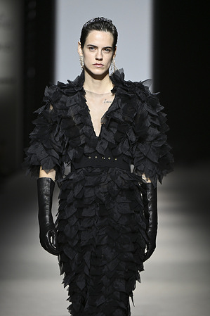 A model walks the runway wearing a design by Yolancris during Mercedes-Benz Fashion Week de Madrid in IFEMA.