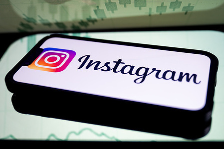 In this photo illustration, an Instagram logo seen displayed on a smartphone screen.