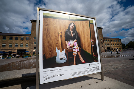 A portrait of Amy Winehouse by photographer Jake Chessum, taken in 2004, is displayed as part of an exhibition dedicated to the singer. Visitors view ‘Amy Winehouse: In Focus’, a free outdoor photography exhibition at Granary Square and King’s Boulevard in King’s Cross, London. The exhibition features defining and previously unseen photographs of the late singer, offering an intimate portrait of her life and career and marking 20 years since the release of her acclaimed album ‘Back to Black’. The exhibition runs from 1 September to 15 October 2026.