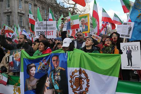 Royalist protesters gather with placards and flags and call for an end to the current Iranian regime during the demonstration. People took part in a rally in solidarity with protesters in Iran. Members of the Iranian community gathered outside Downing Street, calling on the British government to support Iranians as anti-government protests continue across Iran. The demonstrations have followed economic troubles in the country and the regime shutting down the internet and arresting many protesters.