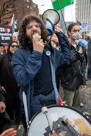 A Palestinian activist shouts through a microphone during an anti war demonstration in Central London. As the war between the USA, Israel, and Iran enters its second week, thousands take part in a “Stop the War” march and rally held in Central London. Organised by a coalition of activist groups, thousands gathered outside in Westminster before marching to the US Embassy in Nine Elms, where a rally was held and speeches delivered by prominent anti-war activists.