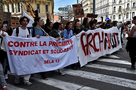 Protesters hold banners during the demonstration. At the call of several unions and other political organizations, several thousand of people marched on the streets of Marseille and everywhere in France to protest against the pension reform wanted by the French government which would raise the retirement age from 62 to 64 years.
