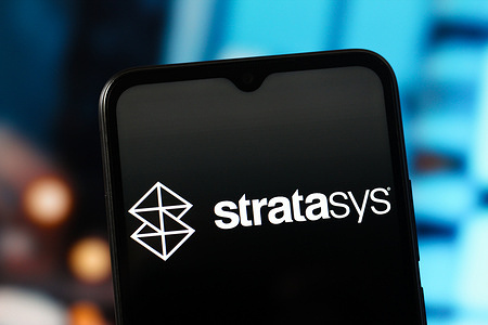 In this photo illustration, the Stratasys logo is seen displayed on a smartphone screen.
