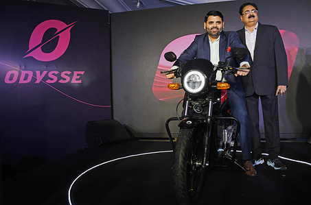 (L-R) Chief Executive Officer (CEO) and Founder of Odysse Electric Vehicles, Nemin Vora (seated on the motorcycle) and Virendra Vora, Chairman, and Advisor pose for a photo during the launch of Odysse electric motorcycle 'Vader' in Mumbai. Odysse aims to provide sustainable and affordable mobility that can be accessible to everyone. The delivery of the Odysse Vader electric motorcycle begins on July 23.