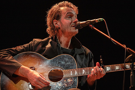 British musician Tom Smith, leader of Editors, performs live at the Claudio Abbado Municipal Theatre during the preview of the 30th edition of the Ferrara Sotto le Stelle festival. Smith presented his debut solo album, "There Is Nothing In The Dark That Isn't There In The Light," in an intimate, acoustic setting.