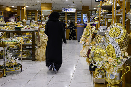 People seen buying chocolates and gifts from a confectionery shop ahead of Eid al-Fitr marking the end of the Muslim holy fasting month of Ramadan. During Ramadan, particularly in the lead-up to Eid al-Fit. The purchase of chocolates, confectionery and flowers reflects longstanding social and cultural traditions and across the Gulf region where gifting sweets is a common expression of generosity and hospitality. Families typically serve or present chocolates during Iftar gatherings and Eid visits with commercially prepared gift boxes increasingly popular linking these purchases directly to Ramadan customs and festive preparations.