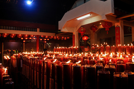 A view of the Dharma Ramsi Temple during the celebration.
Hundreds of candles are lit at midnight and Prayers for the 2571 Chinese New Year as an expression of gratitude for all the fortune and for hope of a better life in the year of the rat.